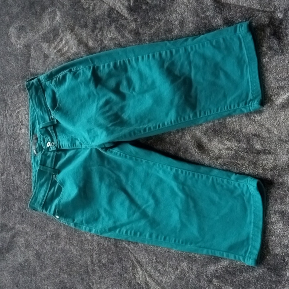 Levi's dark turquoise four pocket crops